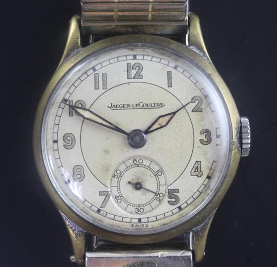 A gentlemans 1930s/1940s steel and gilt Jaeger Le Coultre manual wind wrist watch,